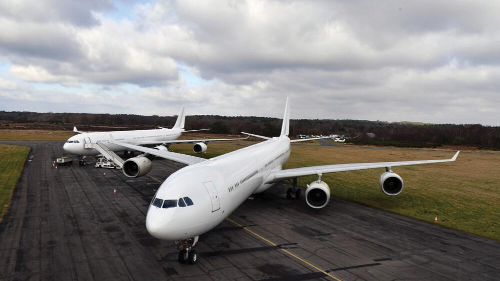 Wide-body A340 aircraft on a runway, global aircraft access across six continents